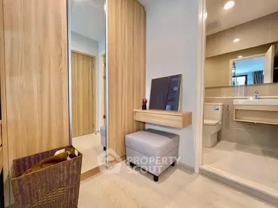 Modern bedroom with ensuite bathroom and stylish wooden accents