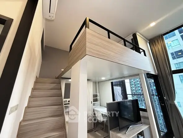 Modern loft apartment with mezzanine and stylish interior design