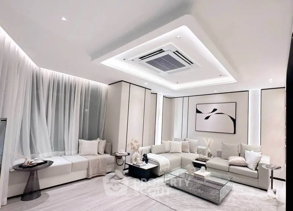 Luxurious modern living room with elegant decor and ambient lighting