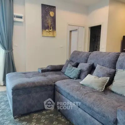 Cozy living room with plush sectional sofa and elegant decor