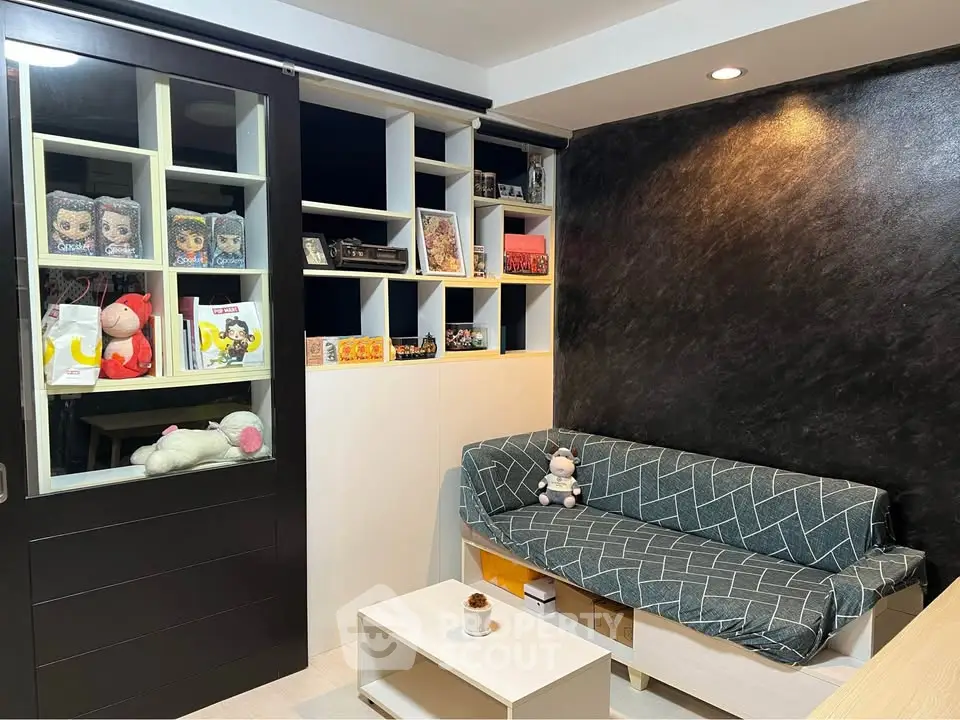 Cozy living room with modern decor and built-in shelving