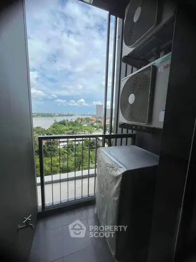 Stunning high-rise balcony with panoramic river view and modern air conditioning units.