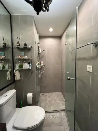 Modern bathroom with sleek shower and elegant tile design