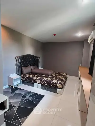 Modern bedroom with stylish bed and sleek decor