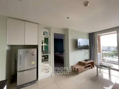 Modern living room with balcony view and sleek furniture