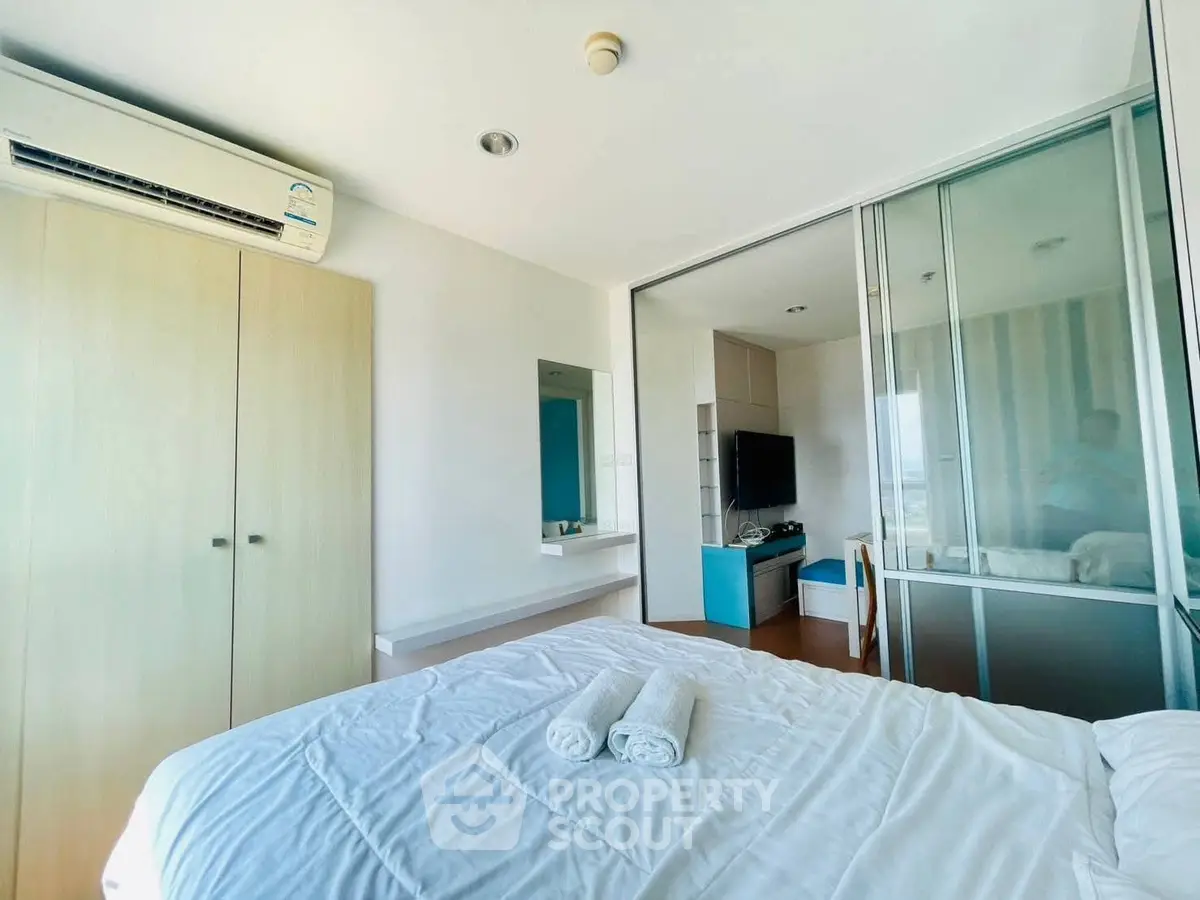 Modern bedroom with air conditioning and sleek design