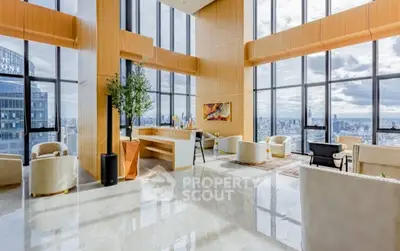 Luxurious high-rise living room with panoramic city views and elegant modern decor.