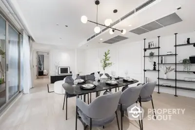 Elegant dining area with modern decor and open layout in luxury apartment