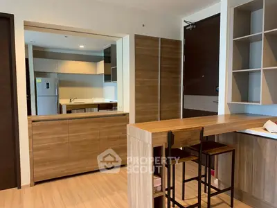 Modern kitchen with open layout and stylish wooden furniture