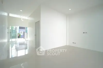 Spacious modern interior with glossy floors and ample natural light, perfect for customization.