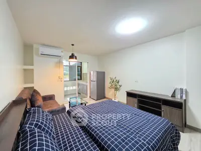 Modern studio apartment with stylish decor and spacious layout