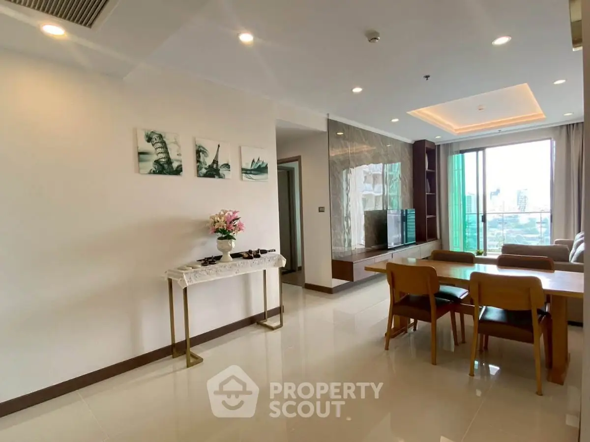 Spacious modern living room with city view and elegant dining area