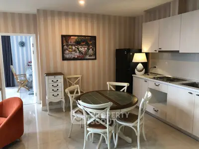Charming kitchen with dining area and modern appliances in stylish apartment
