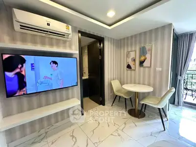 Modern living room with stylish decor and balcony view