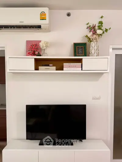 Modern living room with sleek TV setup and stylish decor