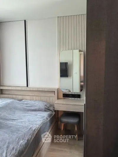 Modern bedroom with stylish wooden furniture and cozy decor