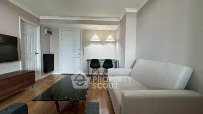 Modern living room with sleek furniture and stylish lighting