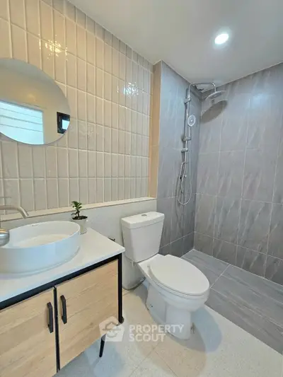 Modern bathroom with sleek fixtures and stylish tile design