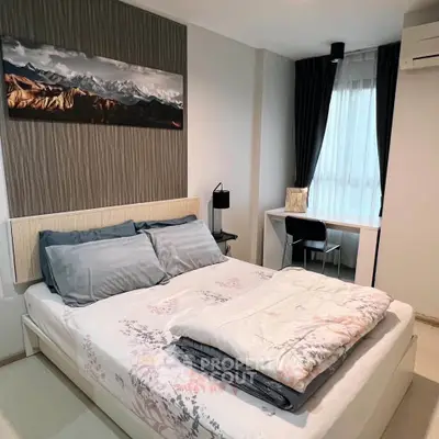 Modern bedroom with stylish decor and natural light, featuring a cozy bed and workspace.