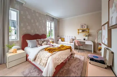 Charming bedroom with stylish decor, cozy bed, and natural light from large windows.