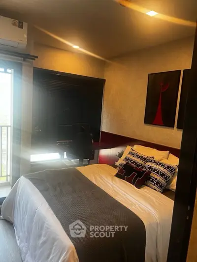 Cozy modern bedroom with stylish decor and natural light