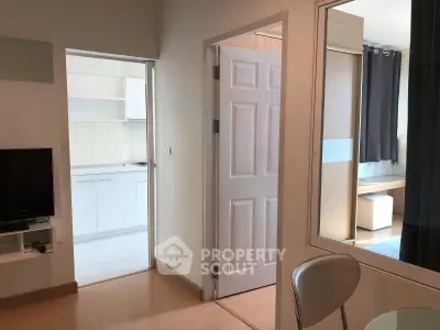 Modern apartment interior with open kitchen and cozy living area