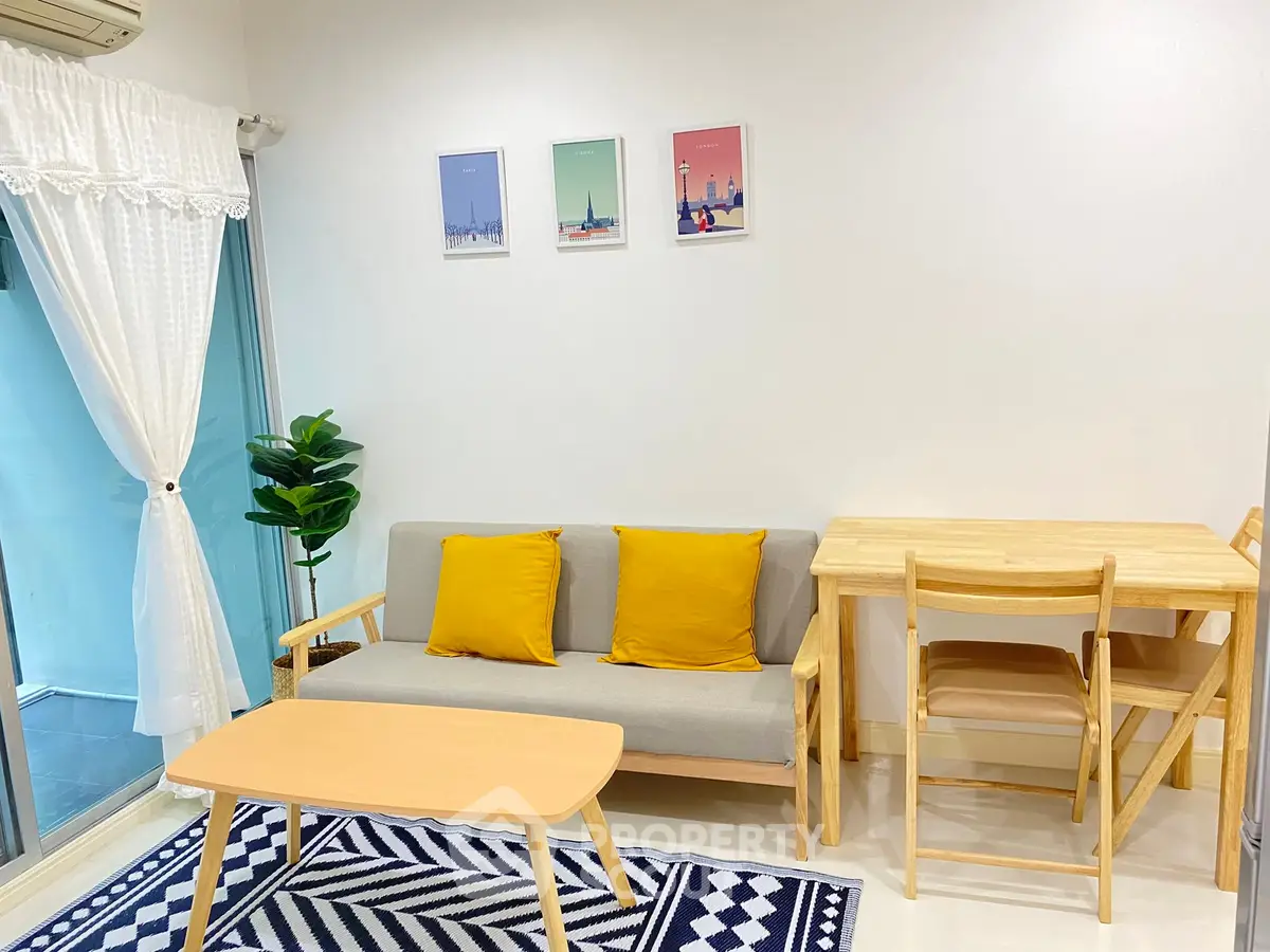 Charming living room with modern decor, cozy seating, and vibrant accents, perfect for relaxation and entertaining.