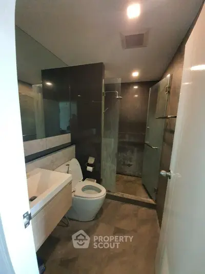 Modern bathroom with sleek design and glass shower enclosure