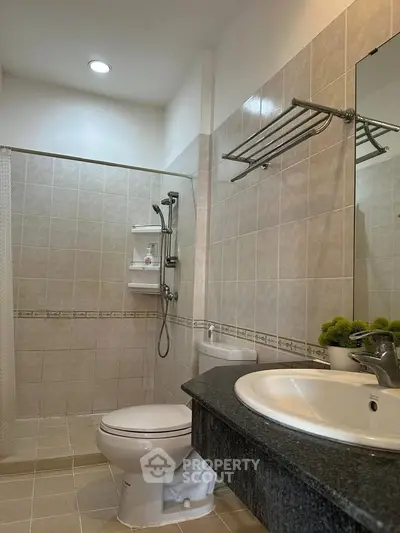 Modern bathroom with sleek fixtures and elegant tile design