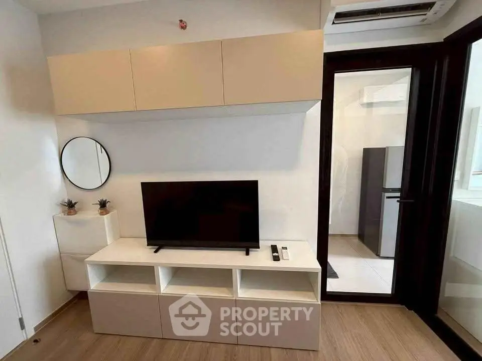 Modern living room with sleek TV unit and stylish decor