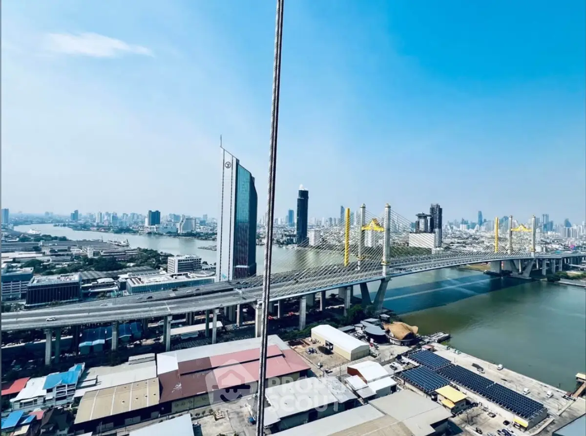 Stunning cityscape view with iconic bridge and skyline, perfect for urban living enthusiasts.