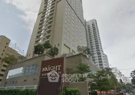 Stunning high-rise building in Sukhumvit 24 with modern architecture and lush greenery.