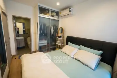 Cozy bedroom with modern design and ample closet space