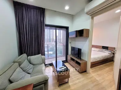 Modern apartment living room with balcony view and cozy bedroom