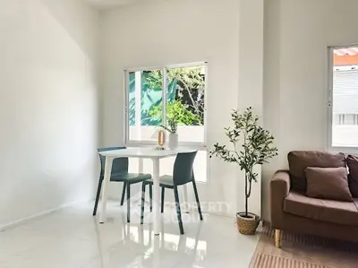 Bright and airy living room with modern furniture and natural light