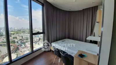 Modern bedroom with panoramic city view and stylish furnishings