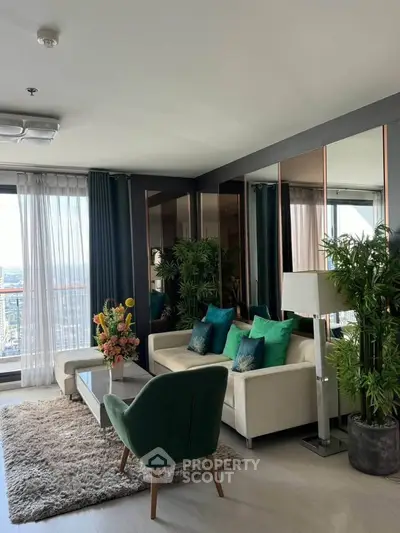 Luxurious living room with modern decor, plush seating, and panoramic city views.