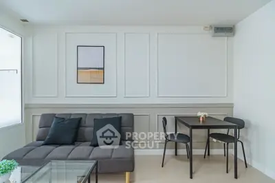 Modern living room with sleek furniture and stylish decor