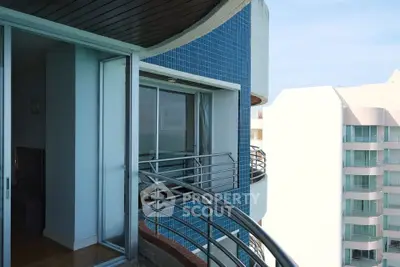 Modern apartment balcony with sleek railing and city view