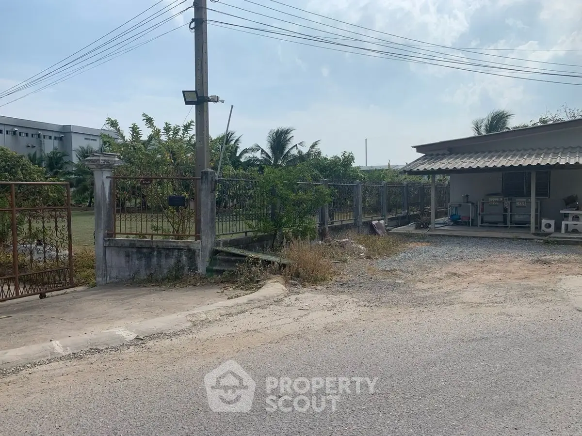 Charming suburban property with spacious yard and rustic exterior, ideal for family living.