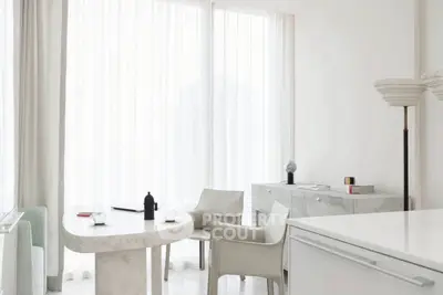 Elegant modern living room with minimalist white decor and stylish furniture