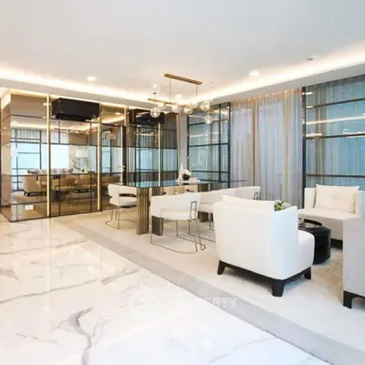 Luxurious modern living room with elegant marble flooring and stylish furniture