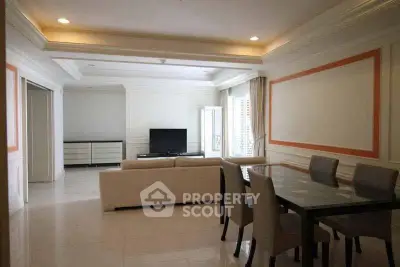 Spacious living room with elegant dining area and modern decor