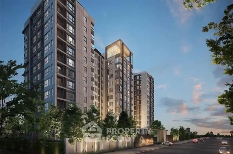 Modern high-rise residential building with lush greenery and evening sky.