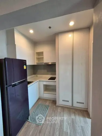 Modern kitchen with sleek design and ample storage space