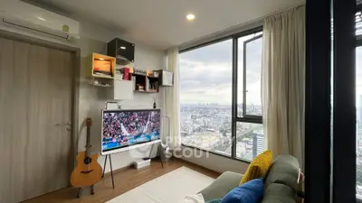 Modern living room with panoramic city view and stylish decor