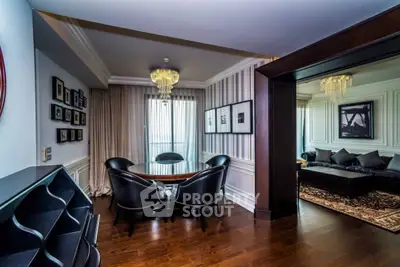 Luxurious living room with elegant dining area and stylish decor