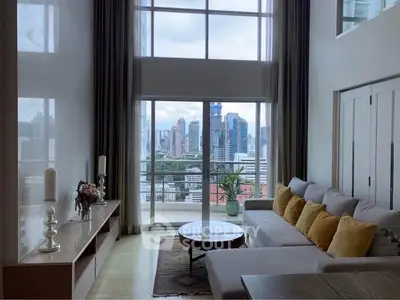 Luxurious living room with stunning city view and elegant decor