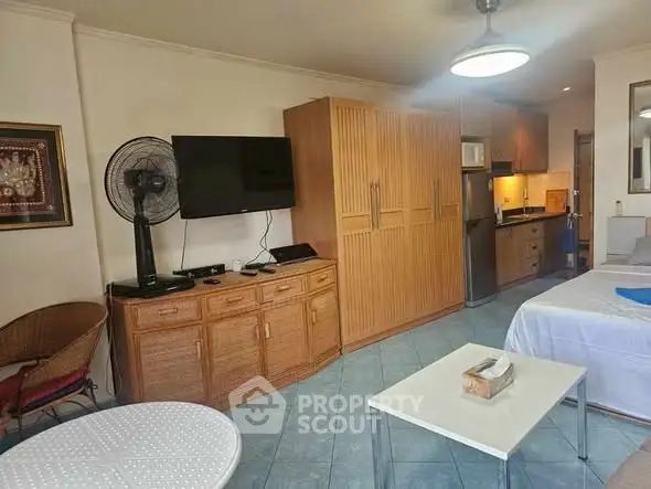 Cozy studio apartment with modern kitchen and stylish decor