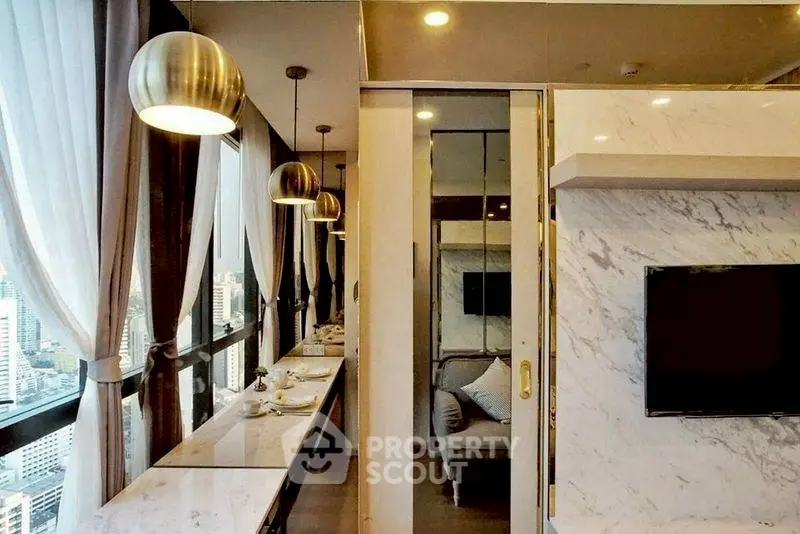 Luxurious high-rise apartment with stunning city view and modern interior design.